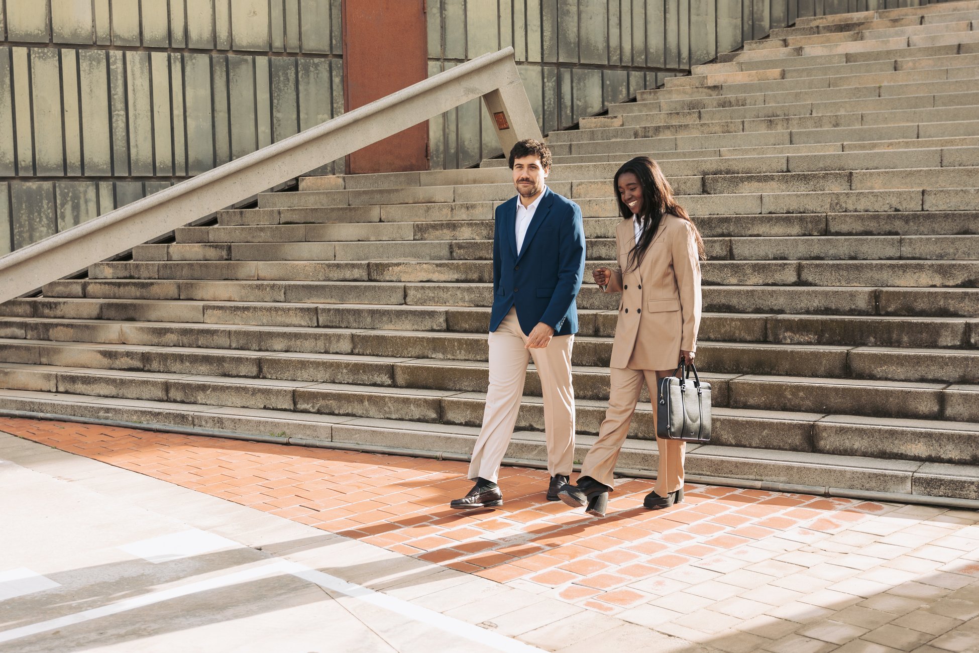 Two Business Partners Traveling Together Outdoors